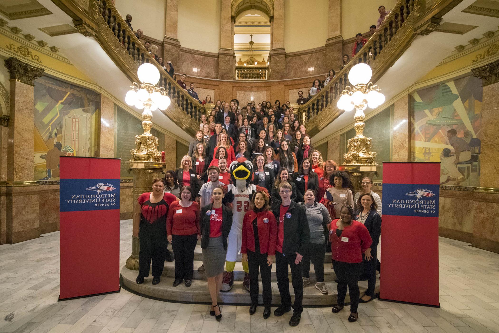 Legislative Day at the Colorado State Capitol. MSU Denver students standing on the steps inside the atrium.